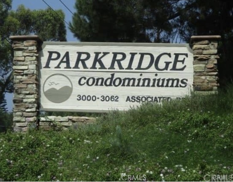 3032 Associated Road, Unit 76 Fullerton, CA 92835 - Photo 14 of 14 a sign broad in front of the road