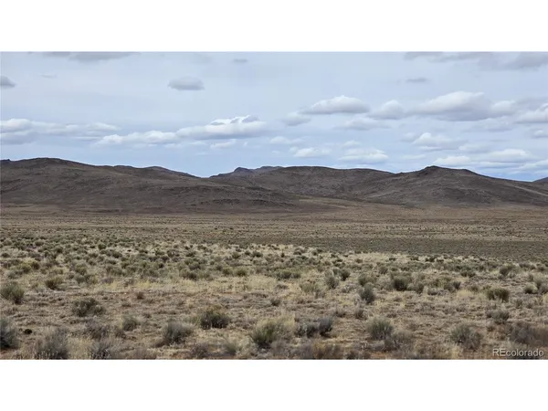 a view of an outdoor space and mountain view