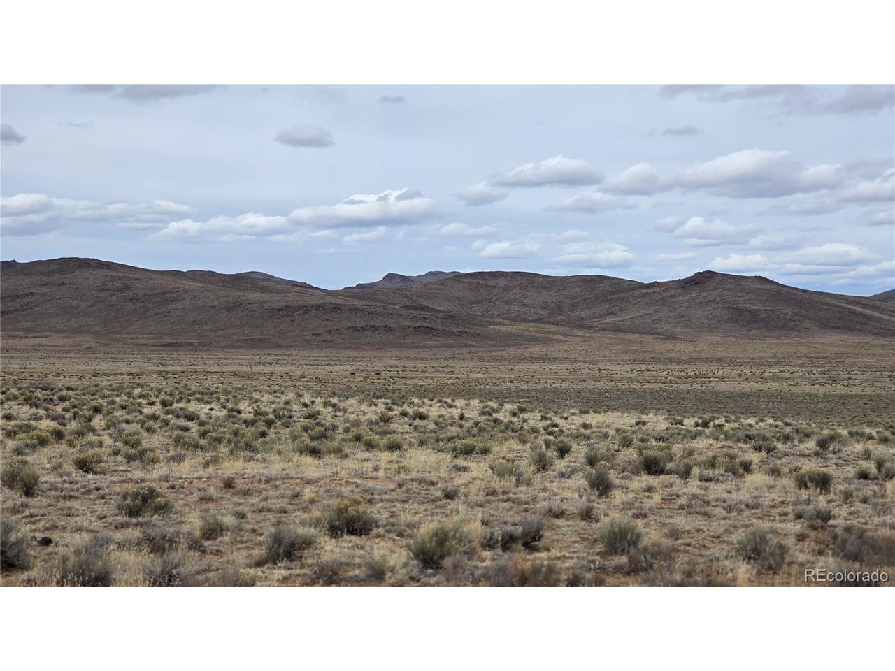 a view of an outdoor space and mountain view