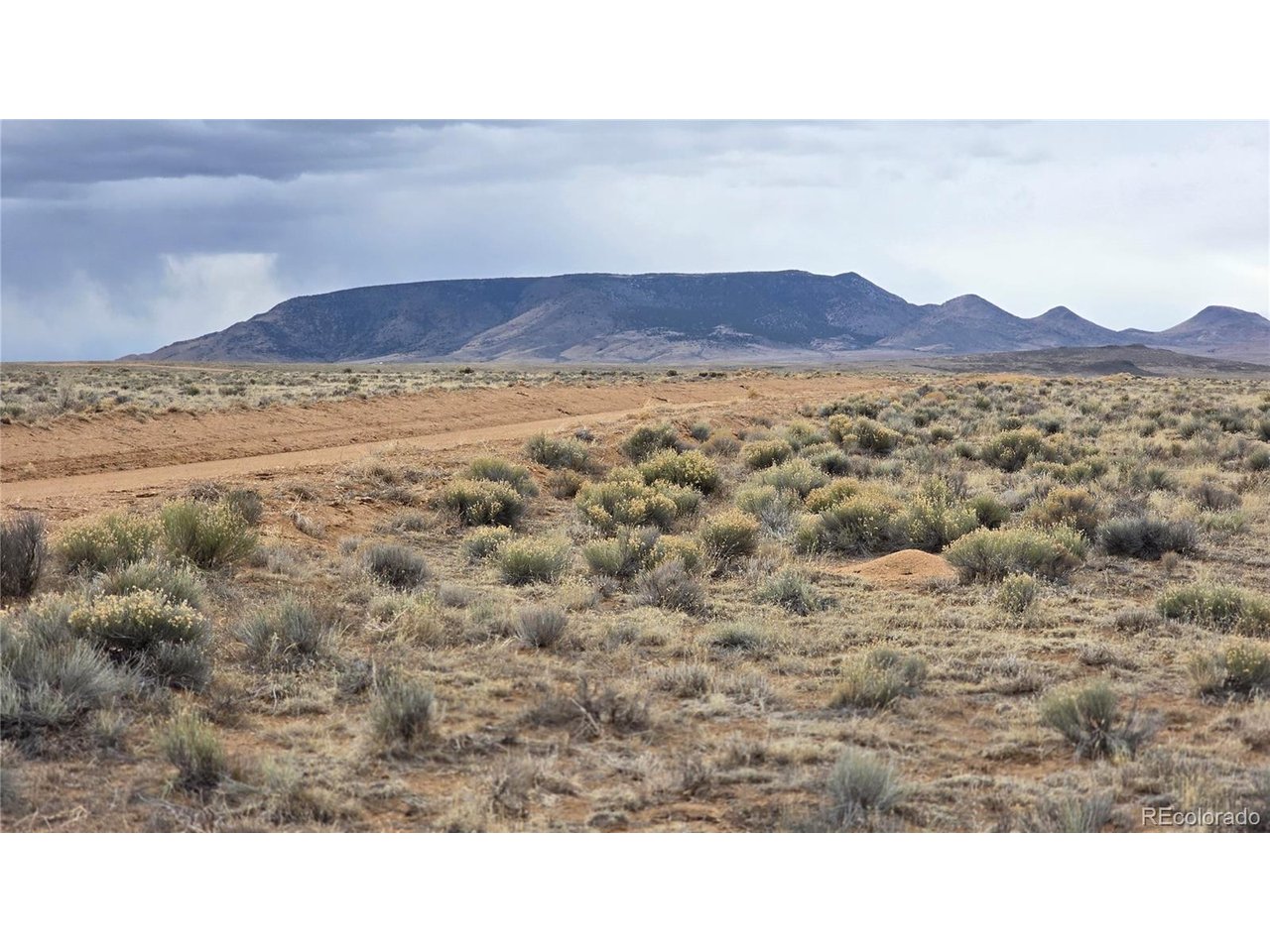3 Russ Road Sanford, CO 81151 - Photo 3 of 11 a black and white photo of a field