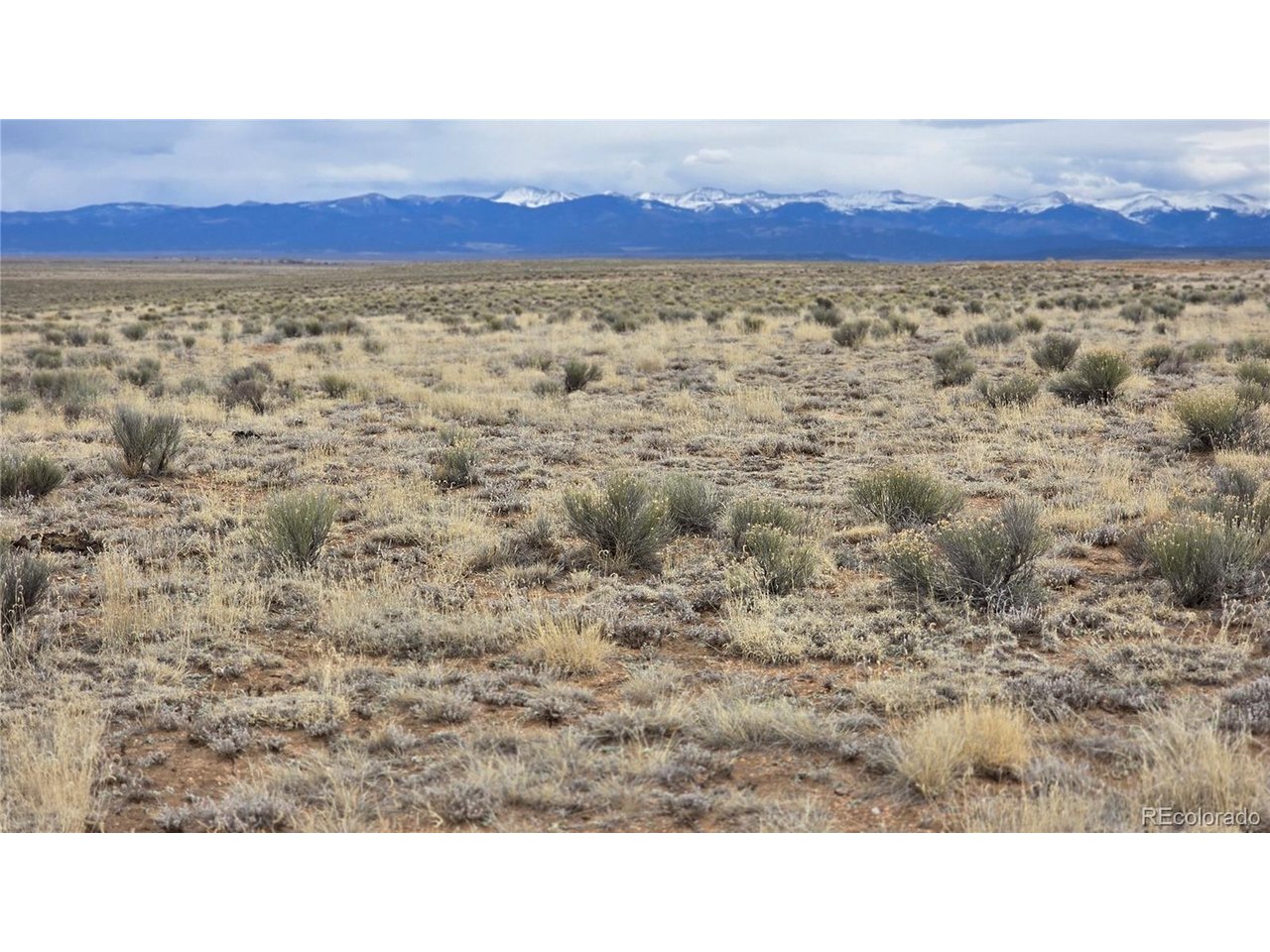 3 Russ Road Sanford, CO 81151 - Photo 6 of 11 a aerial view of a yard