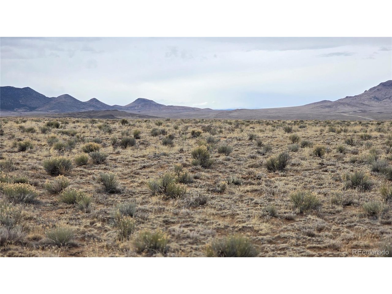 3 Russ Road Sanford, CO 81151 - Photo 7 of 11 a black and white photo of a city