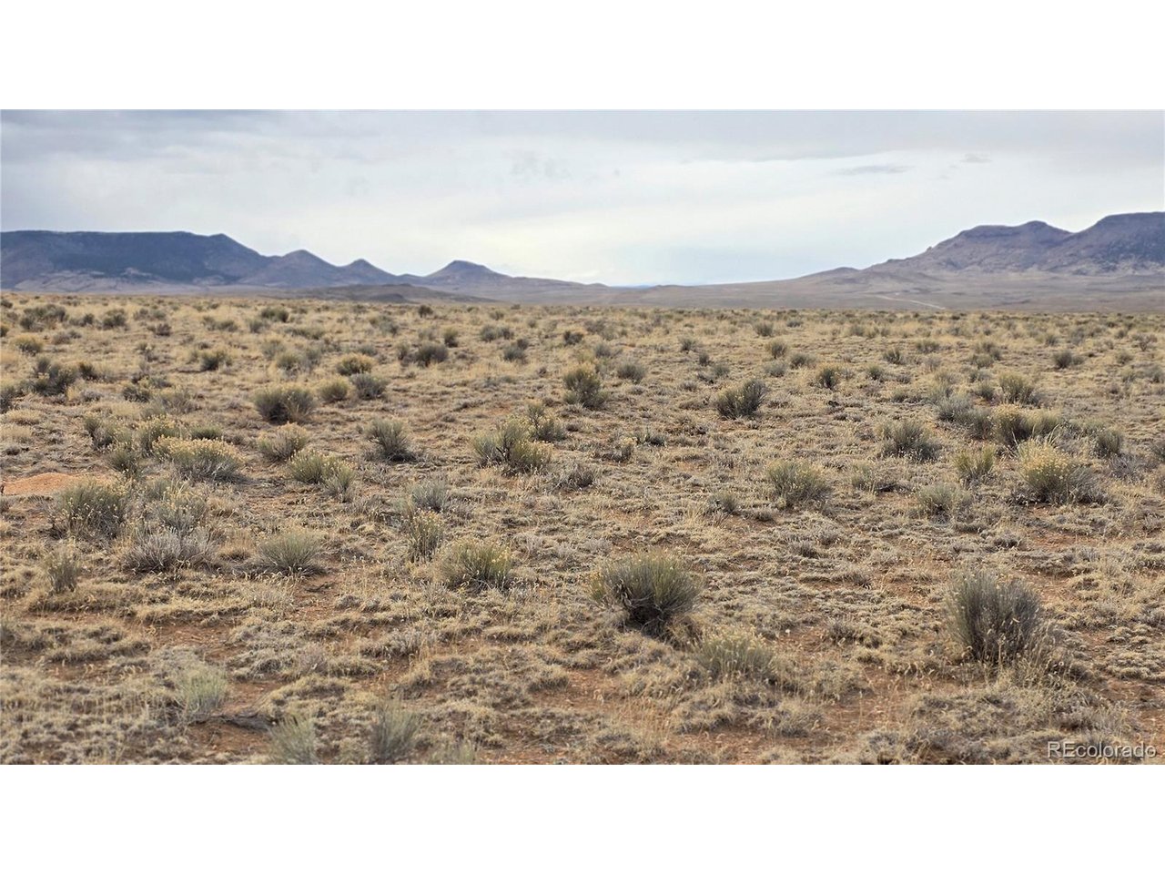 3 Russ Road Sanford, CO 81151 - Photo 8 of 11 a picture of a mountain in the distance