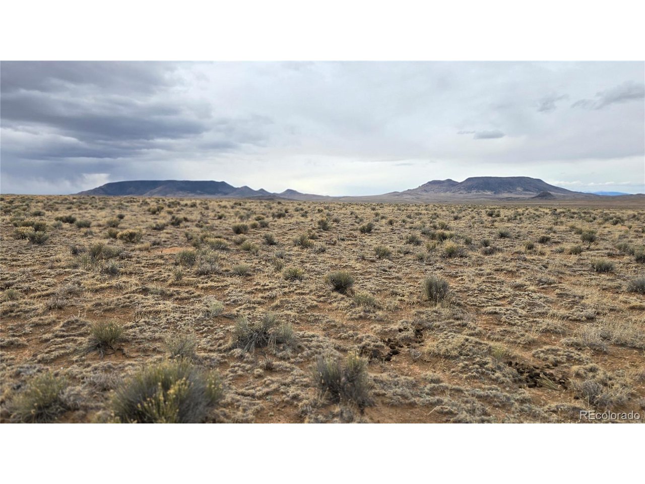 3 Russ Road Sanford, CO 81151 - Photo 9 of 11 a black and white photo of a house
