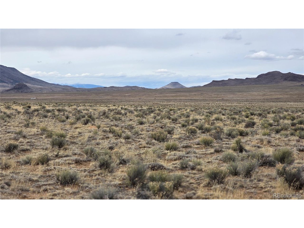 3 Russ Road Sanford, CO 81151 - Photo 10 of 11 a view of a city with sunset view