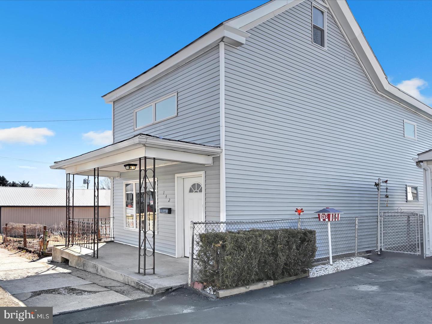 a front view of a house with a garage