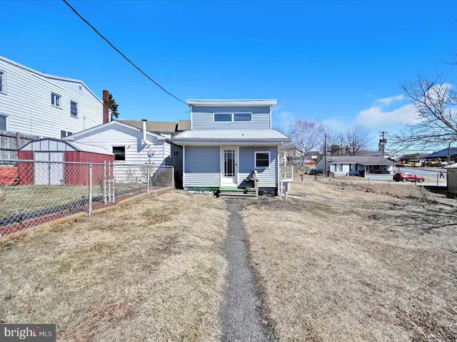 a house with trees in front of it