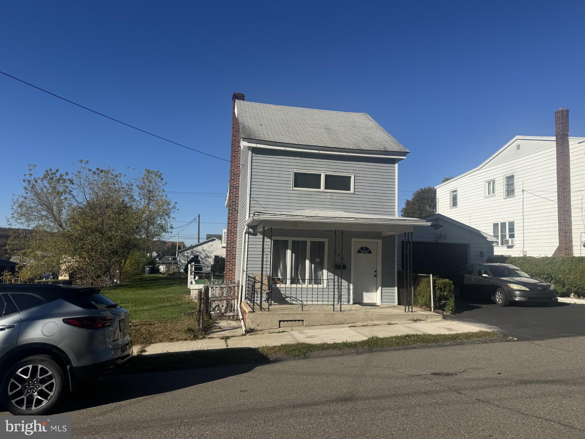 142 South Middle Street Frackville, PA 17931 - Photo 26 of 26 a front view of a house with a garden