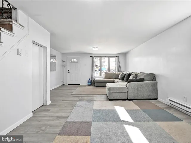 a living room with furniture and a couch