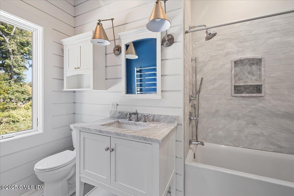424 Taconic Road Greenwich, CT 06831 - Photo 21 of 35 a bathroom with a sink toilet tub and shower