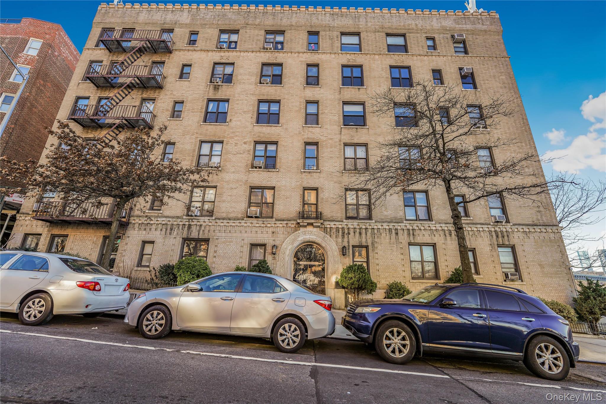 880 West 181st Street, Unit 6G Manhattan, NY 10033 - Photo 13 of 13 a car parked in front of a building