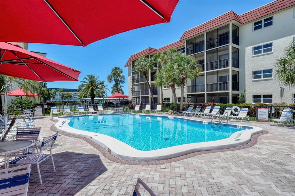 925 Beach Road, Unit 311 Sarasota, FL 34242 - Photo 24 of 53 a view of a house with a swimming pool