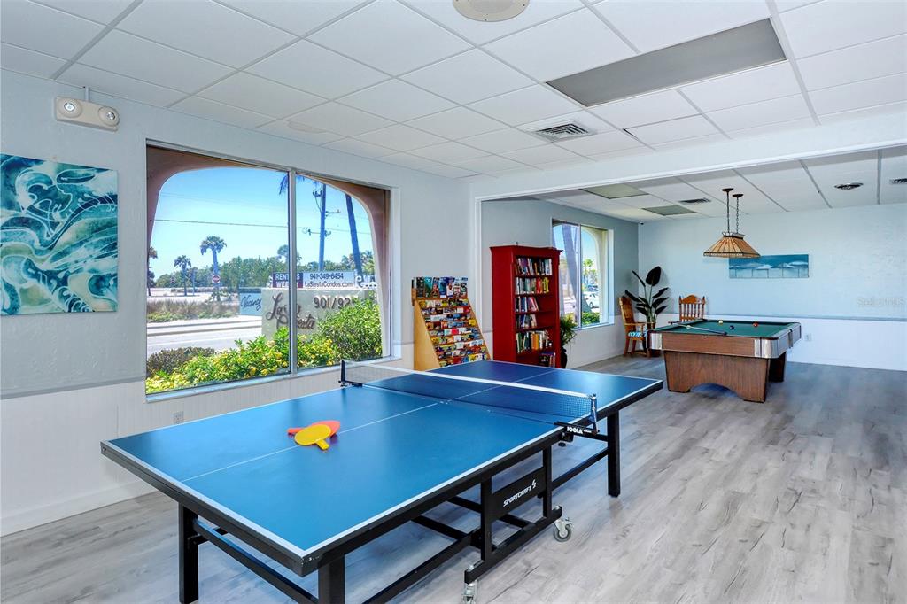 925 Beach Road, Unit 311 Sarasota, FL 34242 - Photo 32 of 53 a room with furniture pool table and windows
