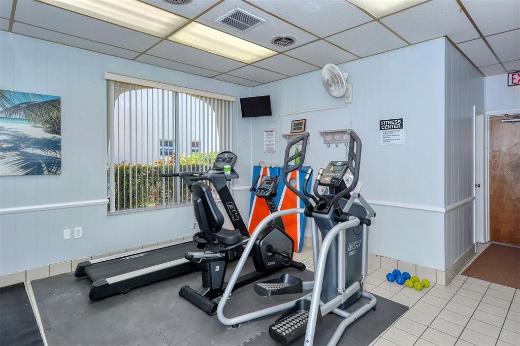 925 Beach Road, Unit 311 Sarasota, FL 34242 - Photo 34 of 53 a view of a room with gym equipment