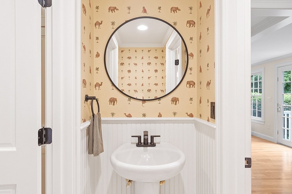 200 Nashoba Road Concord, MA 01742 - Photo 21 of 42 a bathroom with a sink and a mirror