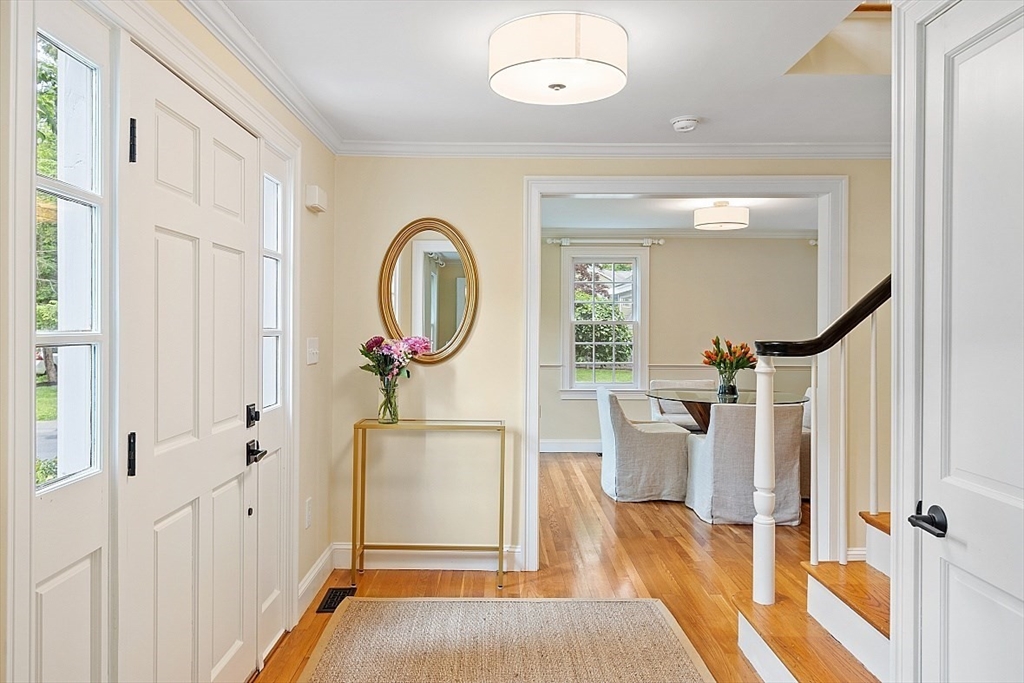 200 Nashoba Road Concord, MA 01742 - Photo 4 of 42 a view of a hallway with wooden floor and entryway