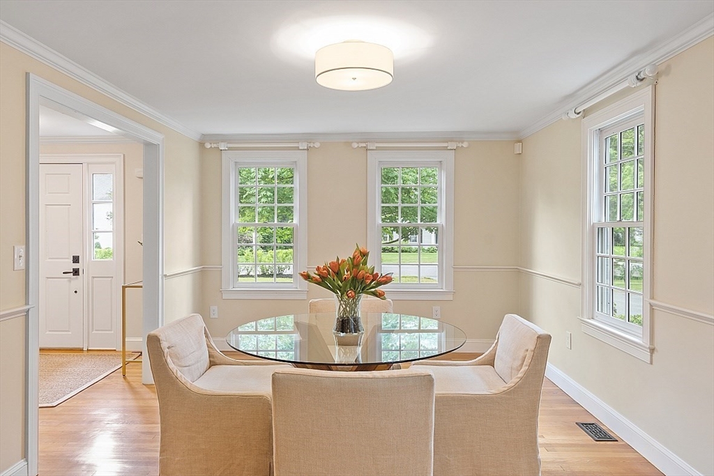200 Nashoba Road Concord, MA 01742 - Photo 9 of 42 a dining room with furniture and wooden floor