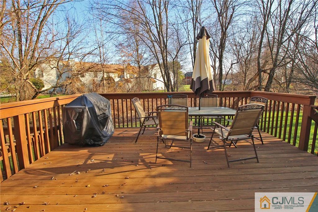 4004 Springbrook Drive Edison, NJ 08820 - Photo 25 of 25 a view of a chairs on the deck