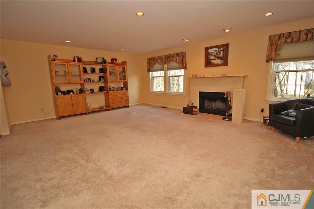 4004 Springbrook Drive Edison, NJ 08820 - Photo 6 of 25 a view of a livingroom with a fireplace