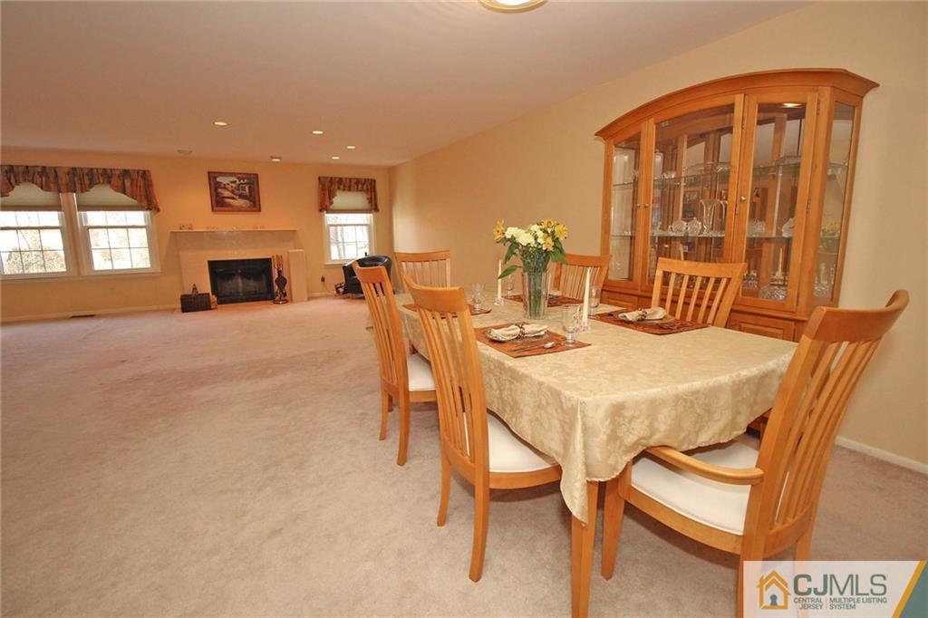 4004 Springbrook Drive Edison, NJ 08820 - Photo 8 of 25 a dinning table and chairs in a room