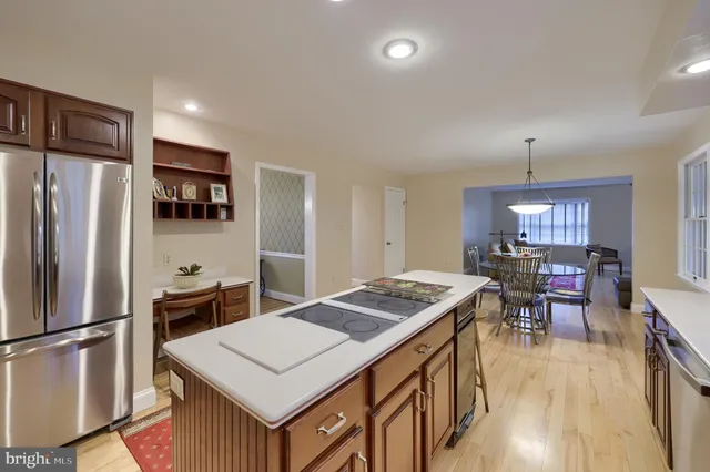 a bathroom with a sink a light fixture and a light fixture
