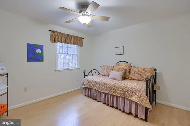 a balcony with furniture and a garden