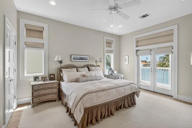 a view of a palm tree from a balcony