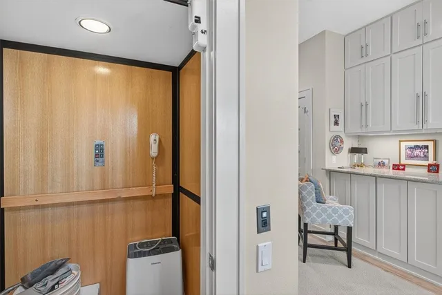 a view of a backyard with plants and a patio