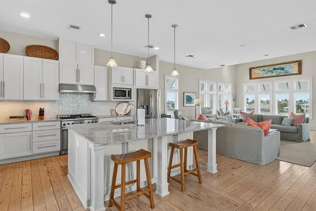 a large kitchen with cabinets