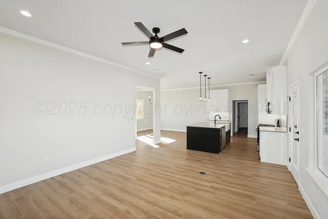 a view of a living room hardwood and wooden floor
