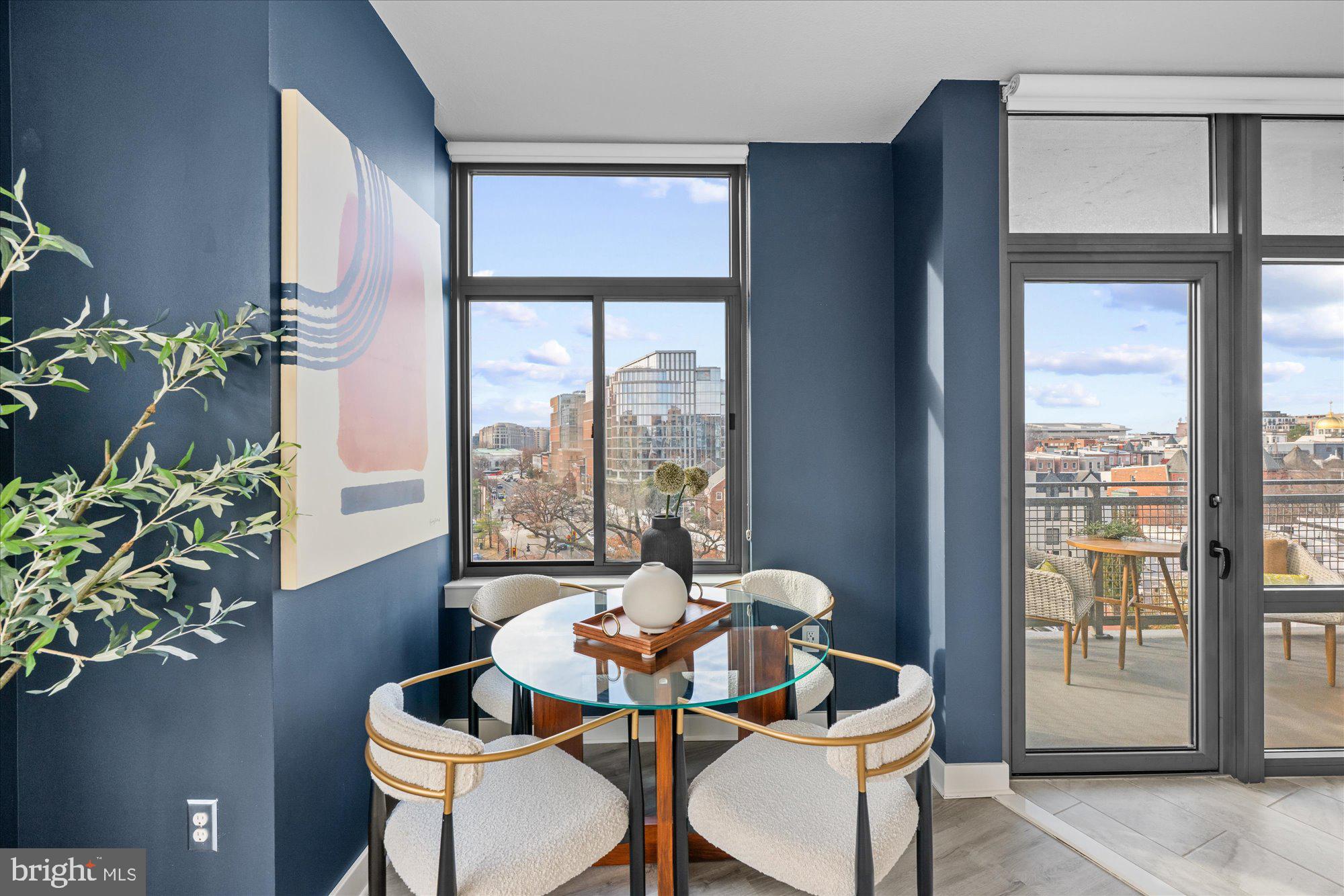 460 New York Avenue Northwest, Unit 504 Washington, DC 20001 - Photo 11 of 62 a living room with furniture and a potted plant