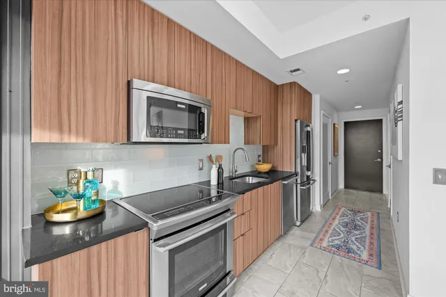 a view of a chairs and table in a balcony