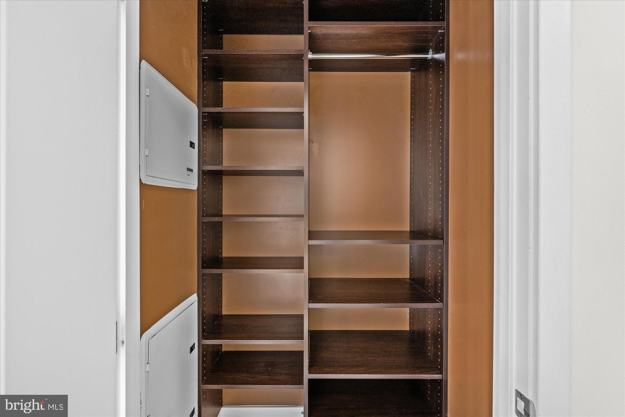 460 New York Avenue Northwest, Unit 504 Washington, DC 20001 - Photo 31 of 62 a view of walk in closet with empty racks