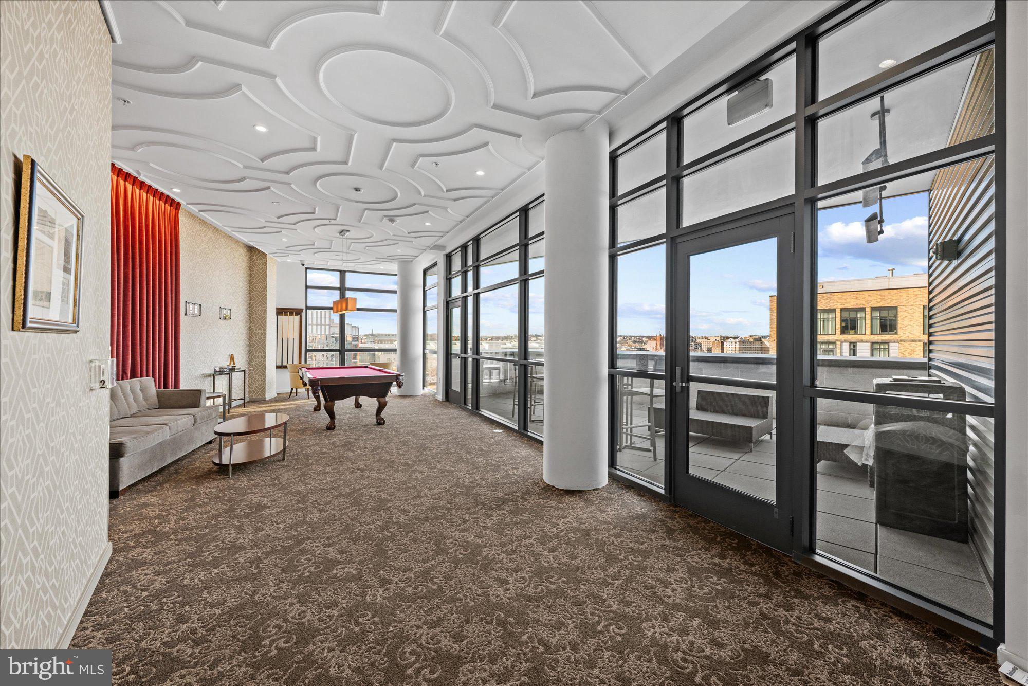 460 New York Avenue Northwest, Unit 504 Washington, DC 20001 - Photo 33 of 62 a view of a livingroom with furniture and window
