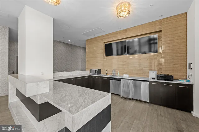 a terrace of a house with outdoor seating