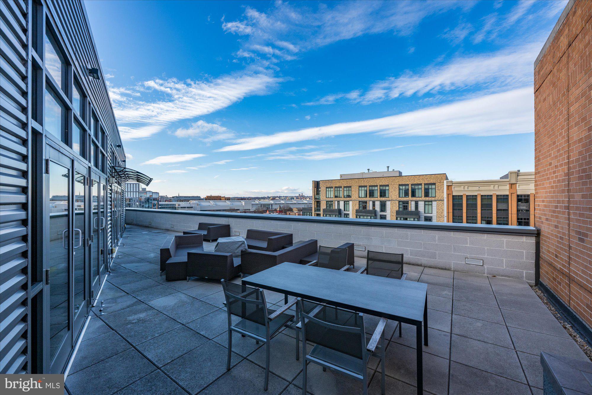 460 New York Avenue Northwest, Unit 504 Washington, DC 20001 - Photo 45 of 62 a terrace of a house with outdoor seating