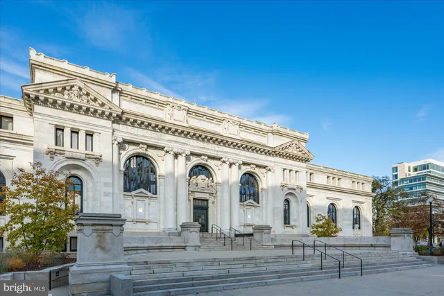 a view of a street with houses