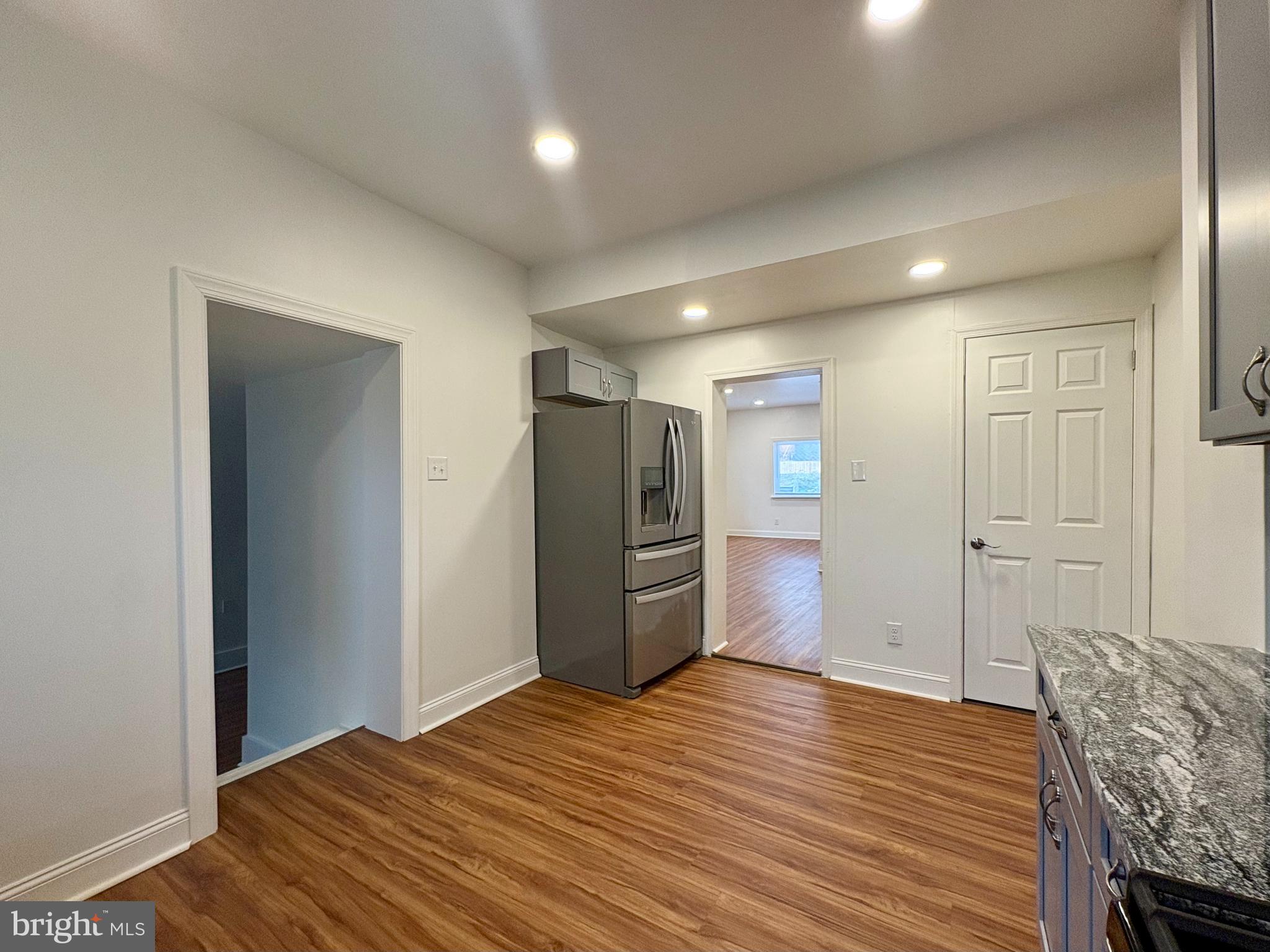 758 Fremont Street Lancaster, PA 17603 - Photo 8 of 20 a view of empty room with furniture and wooden floor