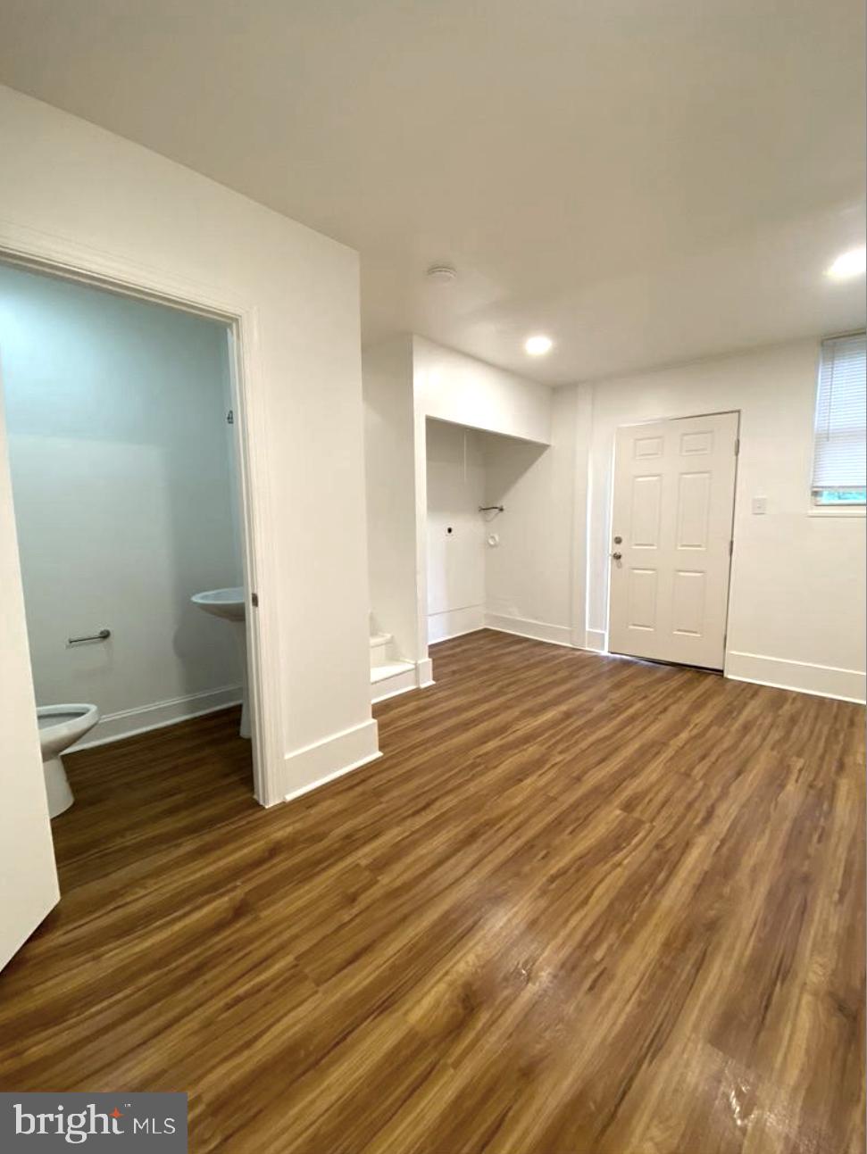 758 Fremont Street Lancaster, PA 17603 - Photo 10 of 20 an empty room with wooden floor