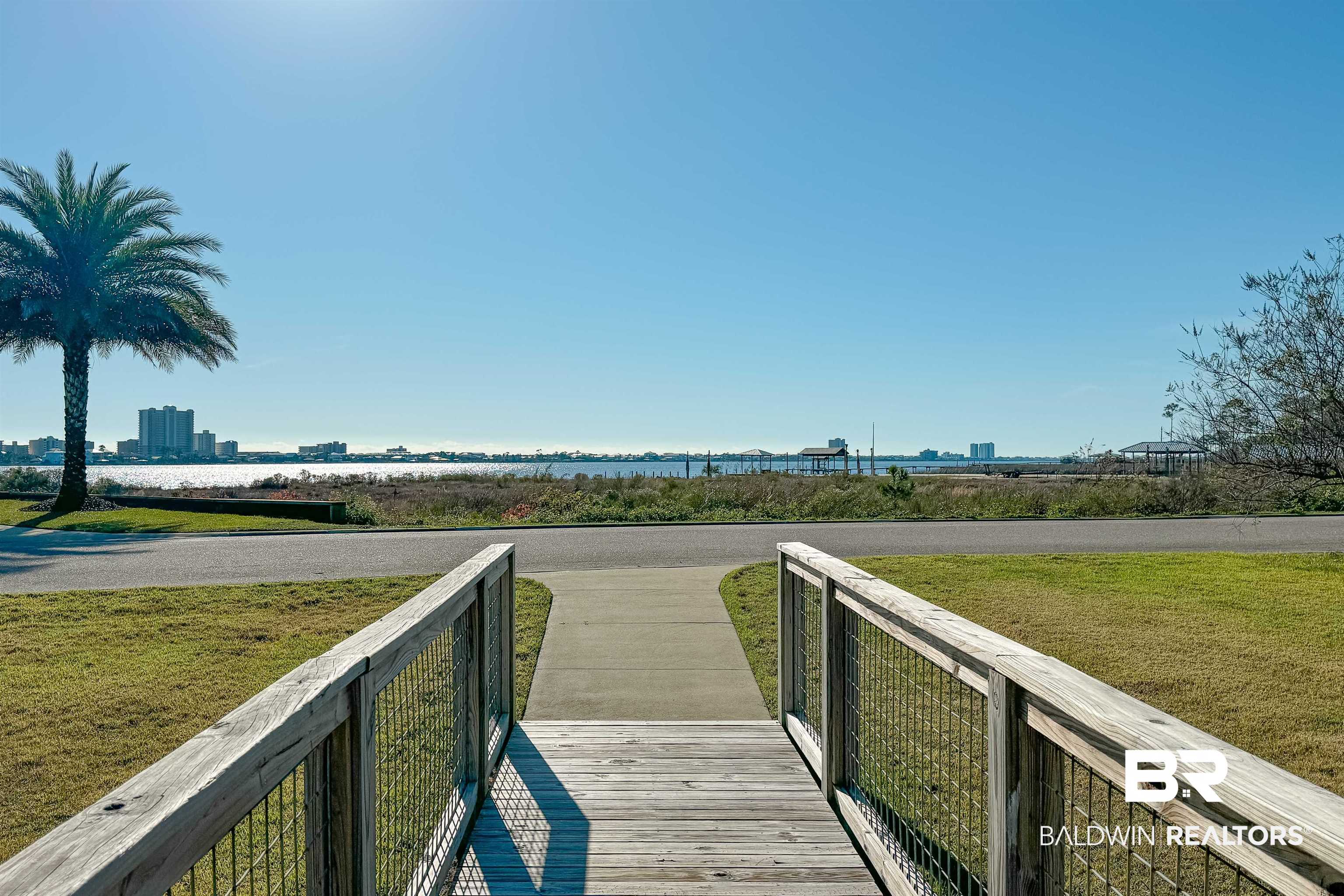 1290 Mako Loop Gulf Shores, AL 36542 - Photo 46 of 50 View of property's community with a lawn