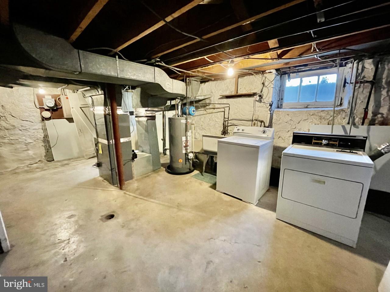 819 Tred Avon Road Baltimore, MD 21212 - Photo 19 of 25 Basement. with Washer/Dryer/Freezer in as is cond.