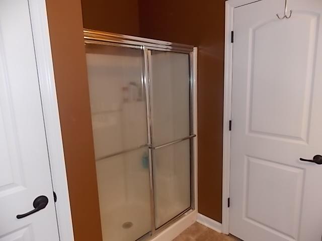 164 Sara Street St. George, SC 29477 - Photo 11 of 16 Master Shower {sliding glass doors}
