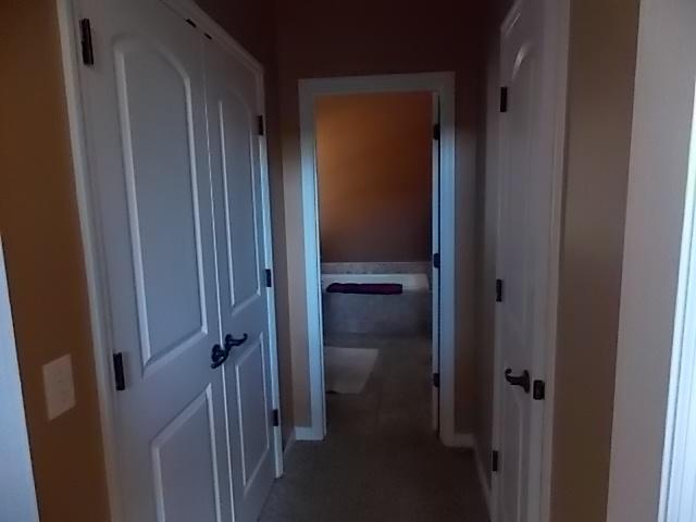 164 Sara Street St. George, SC 29477 - Photo 9 of 16 Hall to M/bath (4'x7') {his&her closets}