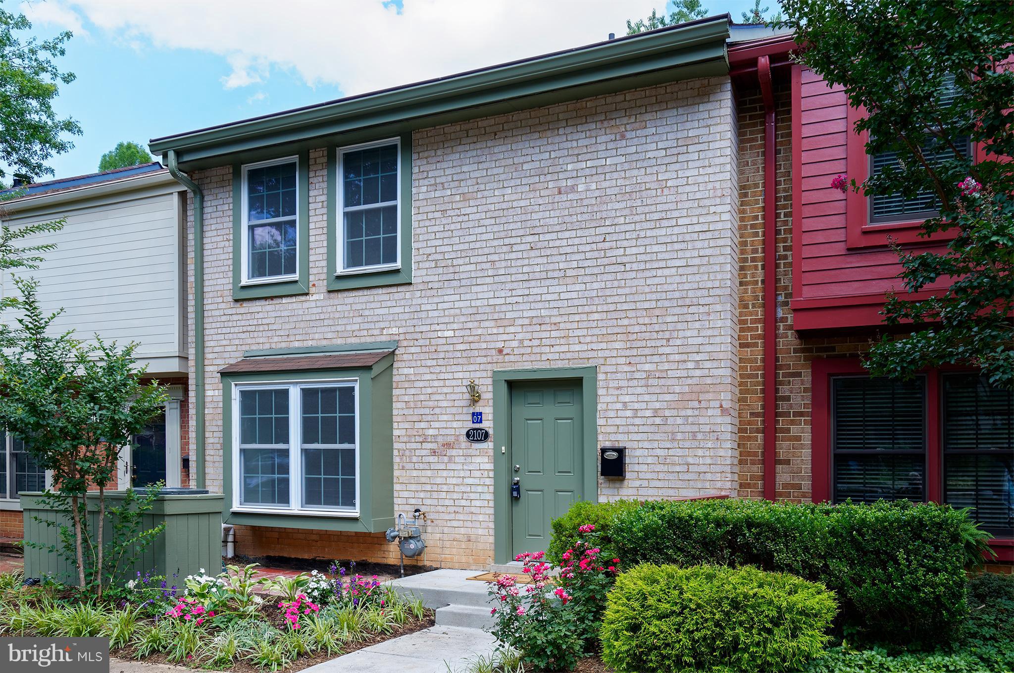 2107 Golf Course Drive Reston, VA 20191 - Photo 1 of 21 BEAUTIFUL 3 LEVEL BRICK TOWNHOUSE WITH WALKOUT