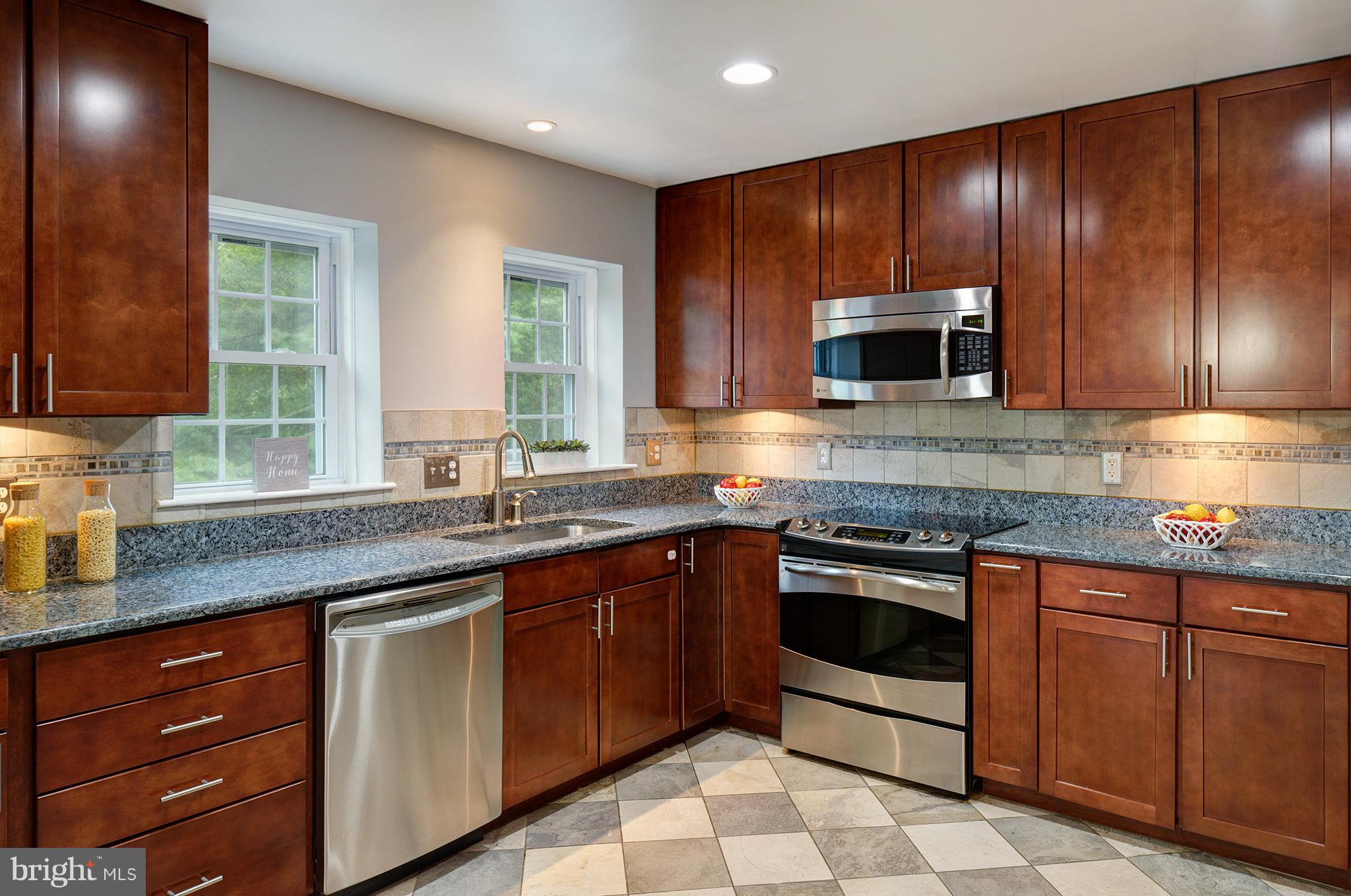 2107 Golf Course Drive Reston, VA 20191 - Photo 8 of 21 CHERRY CABINETS FOR LOADS OF STORAGE