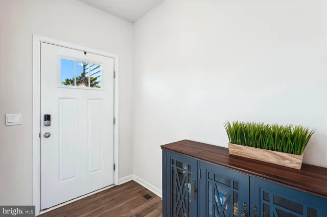 a view of a living room and dining room