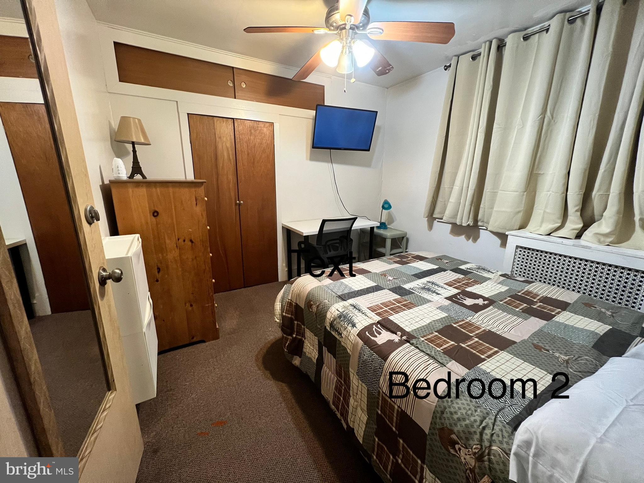 539 Timberlake Road Upper Darby, PA 19082 - Photo 11 of 17 a bed sitting in a bedroom next to a window