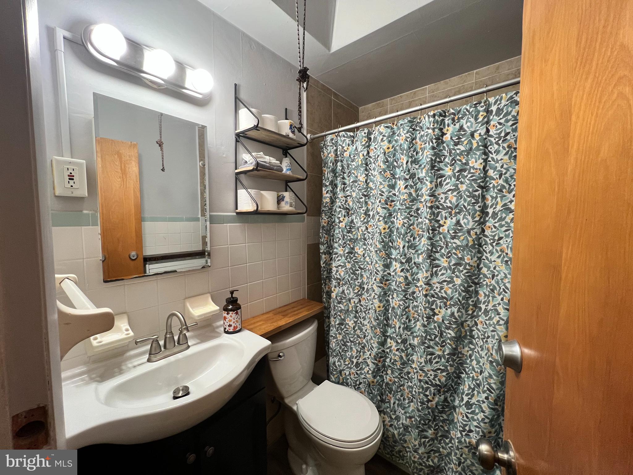 539 Timberlake Road Upper Darby, PA 19082 - Photo 12 of 17 a bathroom with a sink toilet and shower