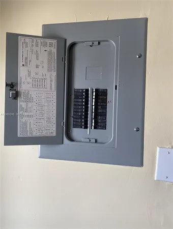 a bathroom with a sink toilet vanity and shower