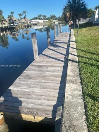 a view of a lake in front of the house